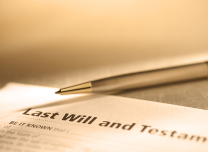 close-up of last will and testament and a pen