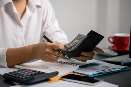 person budgeting money