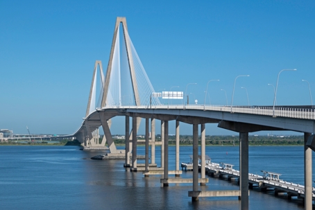 Arthur Ravenel Jr. Bridge, opened in 2005, crosses the Cooper River and Charleston Harbor carries traffic on U.S. 17. Photographed from Mount Pleasant, showing the Waterfront Park pier lower right.